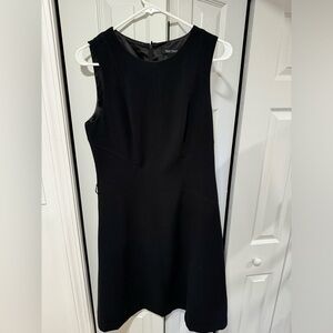 Black zip up dress with flare on bottom, Size 10